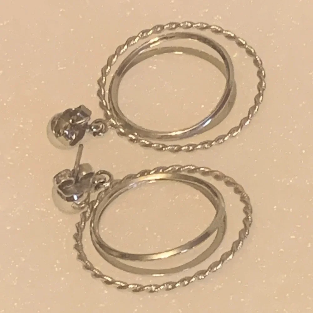 Avon Silver Tone Circular Earrings